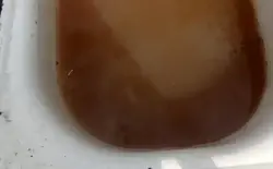 Photo of a rusty bathtub