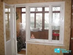 Wooden windows on the loggia photo