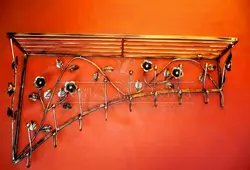 Wrought Iron Hangers In The Hallway Photo