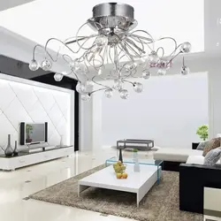 White chandeliers in the living room photo