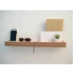 Hanging shelf in the hallway photo
