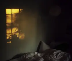 Photo Of A Bedroom At Night With A Window