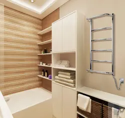 Photo of a heated towel rail in a small bathroom