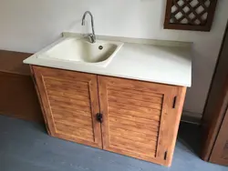 Photo of a kitchen sink cabinet