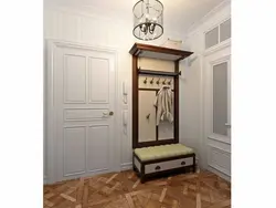 Hallway with banquette and hanger photo