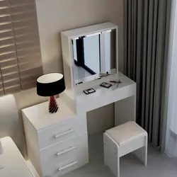 Table with cabinet in the bedroom photo