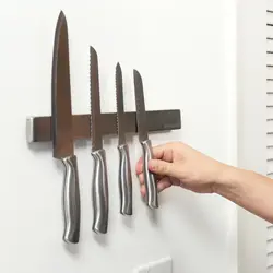 Магнит для ножей фото на кухне