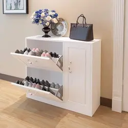 Shoe rack in the hallway made of chipboard photo