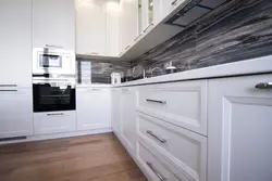 Photo Of White Kitchen With Gray Appliances