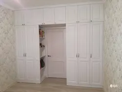 Wardrobe with mezzanine in the bedroom photo