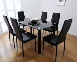 Чорны круглы стол на кухні фота