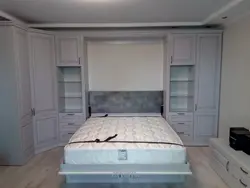 Wardrobe Behind The Bed In The Bedroom Photo