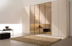 Hinged wardrobes with a mirror in the bedroom photo