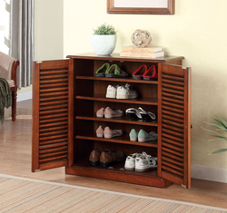 Wooden shoe rack in the hallway photo