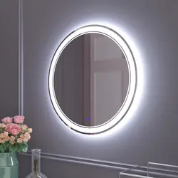 Round mirror with light in the bathroom photo