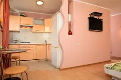 Make a kitchen out of a room in an apartment photo