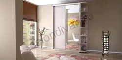 Two-door wardrobe in the hallway with a mirror photo