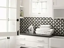 Kitchen apron photo made from black and white tiles