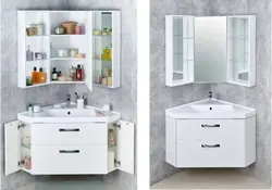 Corner bathroom sinks with cabinet and mirror photo