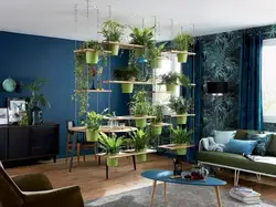 Artificial trees in the living room interior