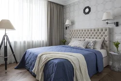 Bedroom interior with blue bedspread
