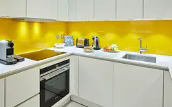 Yellow apron in the kitchen interior