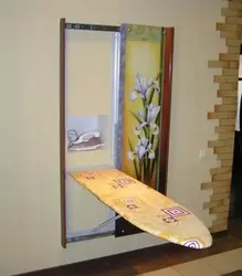 Ironing Board In The Bedroom Interior