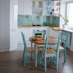 Turquoise chairs for the kitchen in the interior