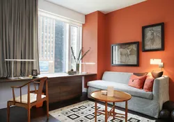 Gray and orange in the bedroom interior