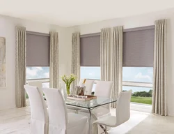 Roman blind in the living room interior with tulle
