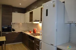 Small kitchen design with microwave and refrigerator