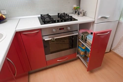 Kitchen with design gas stove, refrigerator and microwave