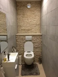 Bir mənzil fotoşəkilində tualet üçün dekorativ gips