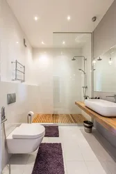 Bathtub in the floor in the apartment photo