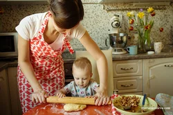 Photo of my mom at home in the kitchen