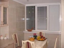 Photo of a plastic window for the kitchen with installation