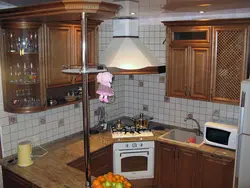 Kitchen design with hood in the corner