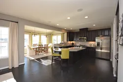 Living room kitchen design with floor-to-ceiling windows