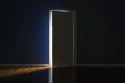 Photo of an open apartment door