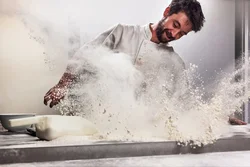 The whole kitchen is covered in flour photo