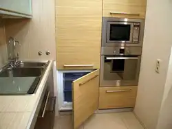 Kitchen with small oven photo