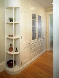 Shelves in a narrow hallway photo