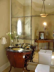 Bathtub with mirror wall photo