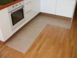 Laminate flooring in a small kitchen photo