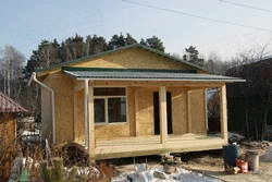 Summer kitchen made of OSB photo