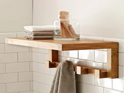 Bathroom shelf for towels photo