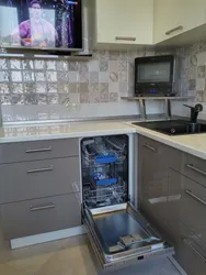 Straight kitchen with dishwasher photo