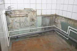 Photo of an old bathroom with tiles