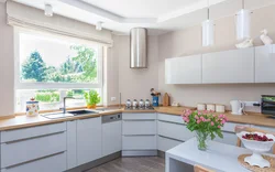 Window design in a white kitchen photo