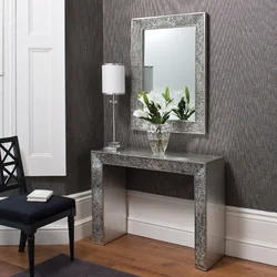 Mirror with table in the hallway photo